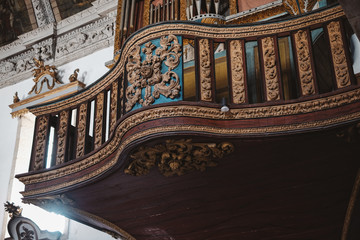 Sticker - Low angle shot of wood carvings inside of an old building in Portugal