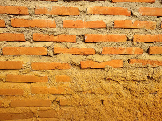 Canvas Print - Closeup shot of a brown stone wall - perfect for background