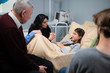 © Anna Kosolapova - Relatives visiting a little girl in a hospital, she is recovering