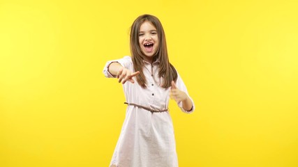 Wall Mural - Funny little child girl laughing and making fun of another