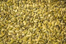 Raw, Organic, Shelled Pumpkin Seeds Background And Texture - Superfood Concept