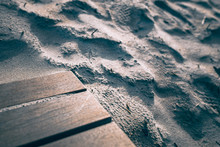 Beach With Sand And Wooden Footway