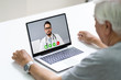 © Andrey Popov - Senior Man In Videochat Or Videoconference With Doctor