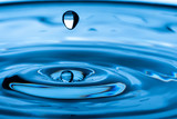 Fototapeta Niebo - Water drop splash. Blue water	