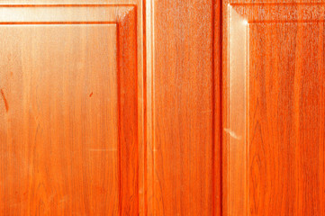 Wall Mural - Closeup shot of a vibrant brown wooden door texture