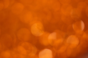 Orange bokeh and yellow blur abstract