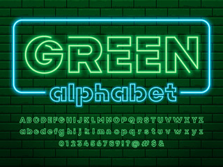 Wall Mural - Glowing neon light alphabet design with uppercase, lowercase, numbers and symbols