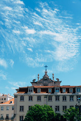 Poster - Vertical shot of buildings and the roof of the Church of St. Dominic at Lisbon Portugal