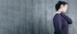 © anut21ng Stock - young asian woman with neck pain on concrete wall for texture background with copy space, muscles problem, healthcare and medicine concept.