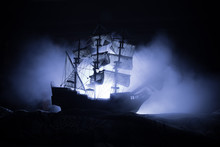 Black Silhouette Of The Pirate Ship In Night