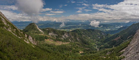 Ferlacher Spitze hill under Mittagskogel hill in summer green day