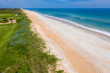 Deserted beach on Atlantic Ocean, at Hammock Beach in Palm Coast, Florida