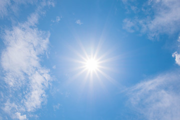 beautiful shining sun at clear blue sky