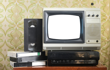 Old silver vintage TV with white screen to add new images to the screen, VCR on the background of wallpaper.