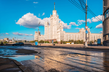 Moscow / Russia - 15 Aug 2020: Panorama of the famous high-rise building in Moscow against the blue sky in Kotelnicheskaya embankment, river walks and tourist season