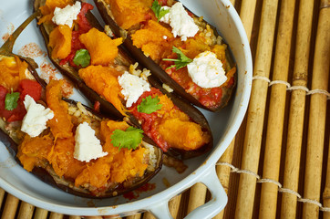 Wall Mural - Baked aubergine stuffed with roast pumpkin, feta