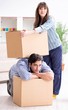 © Elnur - Young family moving in to new apartment after paying off mortgag