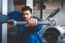 Auto Mechanic With Wrench, Selective Focus.