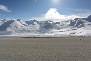 Poster - winter road of free space and landscape of mountains 