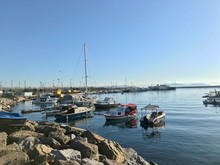 Istanbul Beachfront. Boats And Natural Stones.
