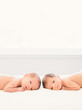 © Clara Lu - newborn twin boys on bed