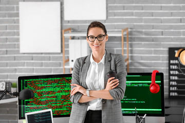 Portrait of female programmer in office