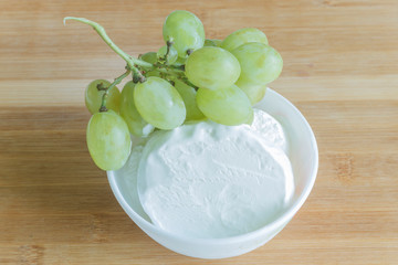 Wall Mural - white ice cream with a bunch of grapes