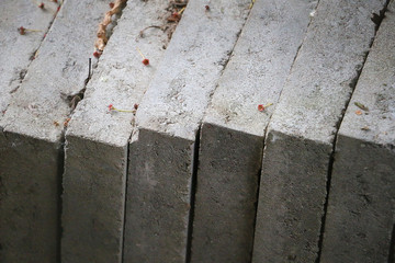 Canvas Print - High angle shot of stone tiles stacked next to each other