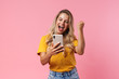 © Drobot Dean - Positive young woman using mobile phone