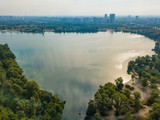 Fototapeta Tęcza - Aerial drone view of the Dnieper River in Kiev. Clear sunny day.