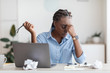 © Prostock-studio - Deadline Stress. Overworked Black Female Entrepreneur Massaging Nosebridge At Workplace In Office