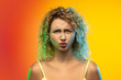 © master1305 - Like a child. Close up caucasian young woman's portrait on gradient studio background in neon. Beautiful female curly model in casual style. Concept of human emotions, facial expression, youth, sales