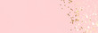 © rorygezfresh - Banner with golden stars confetti scattered on a pink pastel background. Holidays concept with copy space.