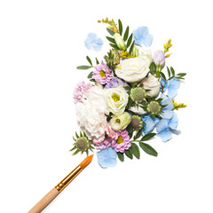 Decor of flowers and brush on white background