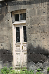 Wall Mural - Vertical shot of an old white wooden door
