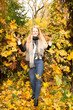 © Photo by ERIKS ROZE - Beautiful young woman portrait in park in Autumn fall
