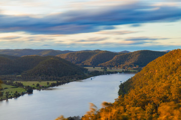 Wall Mural - Cloudy sunset view from Hawkins lookout, Hawkesbury River, Sydney, Australia.