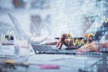 Fototapete - Double exposure of woman hands typing on computer and forex chart hologram drawing. Stock market invest concept.