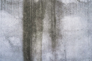 Texture of a smooth gray concrete wall as background or wallpaper. Close up of concrete wall with rough texture. Cement texture.