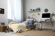 © New Africa - Stylish teenager's room interior with comfortable bed and workplace