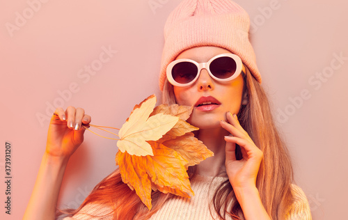 Fashionable hipster woman in Trendy autumn fall outfit, stylish hair, makeup Poster Mural XXL
