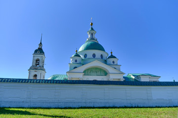 Scenic view of old Spasso-Yakovlevsky Monastery (Monastery of St. Jacob Saviour) in Rostov Veliky in Yaroslavl Oblast in Russian Federation. Beautiful summer sunny look of orthodox temple