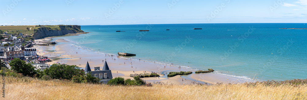Arromanches, France - 08 04 2020: View of the Landing Beach from the cliffs - obrazy, fototapety, plakaty 