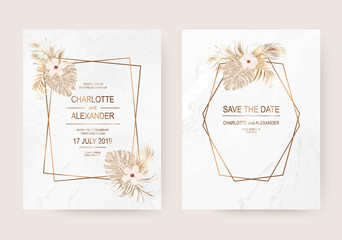 White marble invitation design cards with dry gold tropical palm leaves and hibiscus flowers.