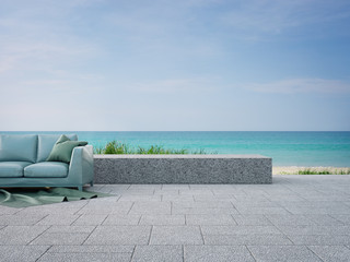 Wall Mural - Sofa on outdoor terrace near garden in modern beach house or luxury villa. Cozy home patio 3d rendering with sea view.