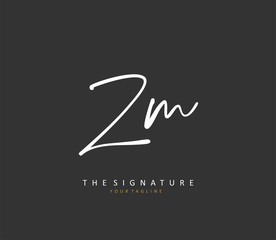 Z M ZM Initial letter handwriting and signature logo. A concept handwriting initial logo with template element.