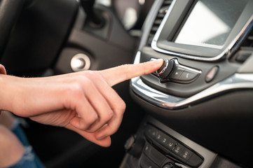 The air conditioning button inside a car. Car interior. Car air condition.