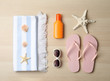 © New Africa - Flat lay composition with beach objects on wooden background