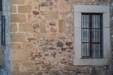 old window in a stone wall