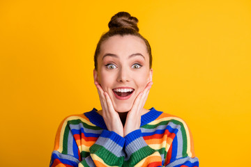 Poster - Portrait of astonished positive girl look wonderful novelty impressed touch face hands cheeks cheekbones wear sweater isolated over shine color background